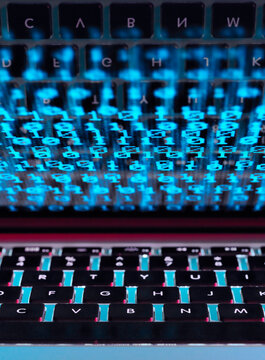 Computer virus infecting a laptop computer with a virus