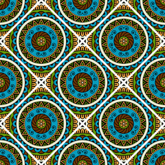 Abstract seamless backdrop. Round colorful texture in green, blue and white colors. Mandala tile background. Oriental pattern for design