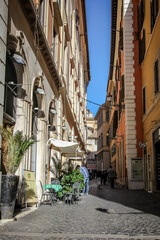 Fototapeta na wymiar Roman street on a sunny autumn day. Rome, Italy.