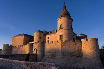 SIMANCAS, SPAIN - MARCH 07, 2020: Historical Archive castle of Simancas in Valladolid at sunset with blue sky, Castilla y Leon, Spain.