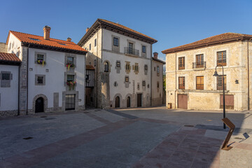 Fototapeta na wymiar Santa Ana square in the old town of the beautiful village of Llanes in north of Spain at sunrise.