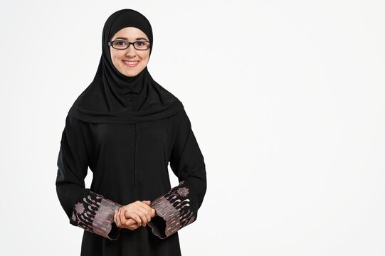 Happy Emarati women wearing Abaya cultural outfit.