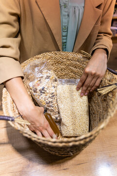 Young woman shopping in a food shop