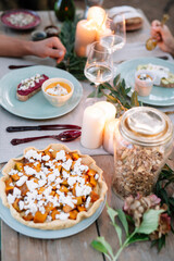 Close-up of couple having a romantic candlelight meal outdoors