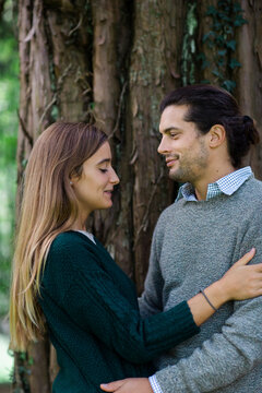 Happy affectionate couple embracing outdoors