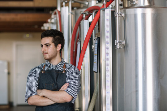 Portrait of young brewer at a brewery