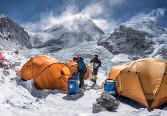 Nepal, Solo Khumbu, Everest Base Camp, Two mountaineers preparing tents