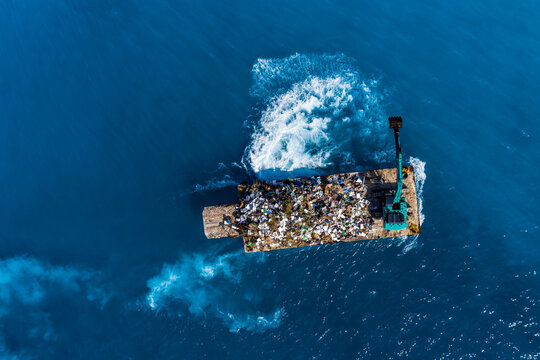 Maledives, South-Male-Atoll, plastic waste disposal with digger from above