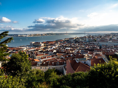 View over the city with Ponte 25 de Abril Tejo River from Miradouro da Nossa Senhora do Monte, Lisbon, Portugal
