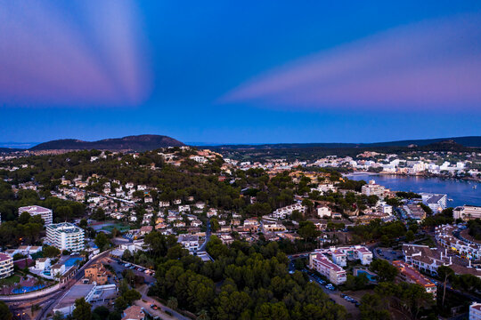 Spain, Balearic Islands, Mallorca, Calvia region, Aerial view over Costa de la Calma and Santa Ponca with hotels and beaches at sunset