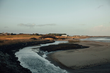 Germany, Schleswig-Holstein, Keitum, Sandy coastal beach of Wadden Sea National Parks at dusk