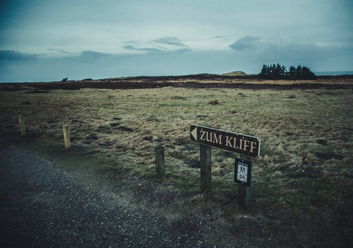 Germany, Sylt, Wadden Sea National Park, dune landscape, Morsum Kliff, sign post, blue hour
