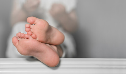 Close-up of little child barefooted feet