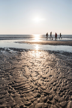 Denmark, Romo, Sandy coastal beach at sunset