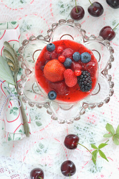 Red Fruit Jelly with whole fruits in glass bowl