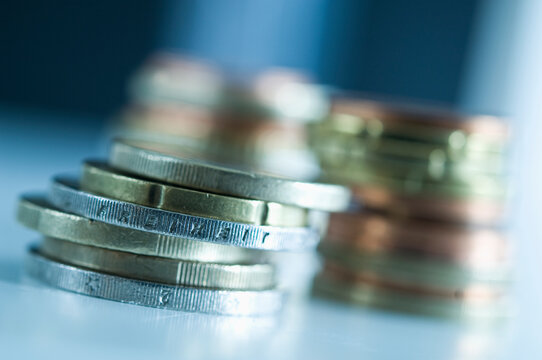 Stack of euro coins with inscription 'Freedom'
