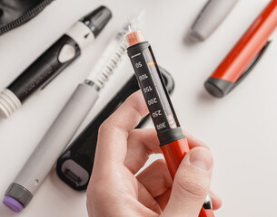 Medicine, diabetes, glycemia, healthcare and people concept. Insulin and blood sugar meter, diabetes kit . World Diabetes day, 14 November