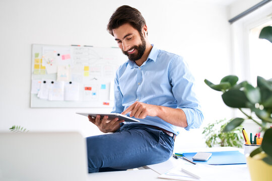 Businessman using a digital tablet in his office