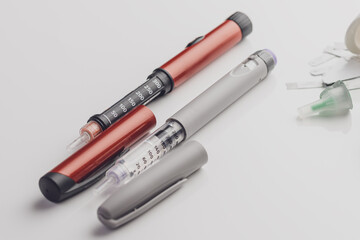 Medicine, diabetes, glycemia, healthcare and people concept. Insulin and blood sugar meter, diabetes kit . World Diabetes day, 14 November