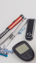 Medicine, diabetes, glycemia, healthcare and people concept. Insulin and blood sugar meter, diabetes kit . World Diabetes day, 14 November