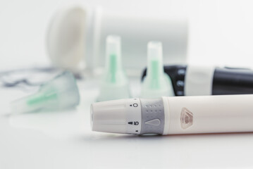 Medicine, diabetes, glycemia, healthcare and people concept. Insulin and blood sugar meter, diabetes kit . World Diabetes day, 14 November