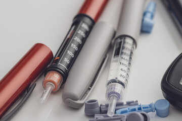 Medicine, diabetes, glycemia, healthcare and people concept. Insulin and blood sugar meter, diabetes kit . World Diabetes day, 14 November