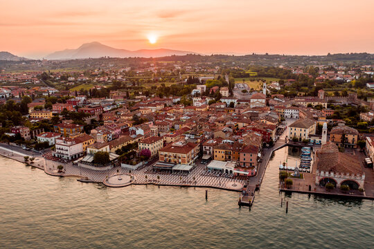 Italy, Veneto, Lazise at Lake Garda, drone view at sunrise