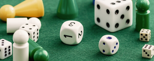 Colored board game figures with dice. Board games concept