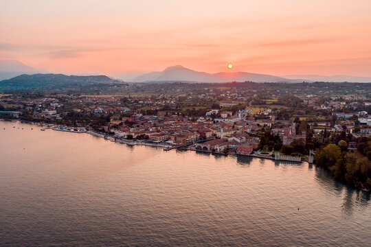 Italy, Veneto, Lazise at Lake Garda, drone view at sunrise