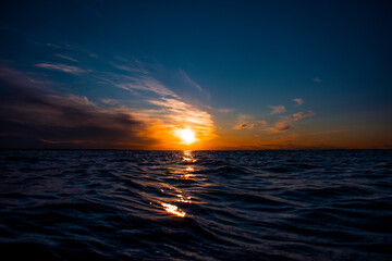 Bright sunset over the water