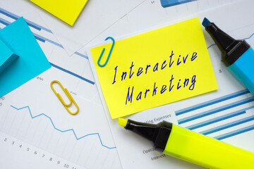Financial concept meaning Interactive Marketing with sign on the page.