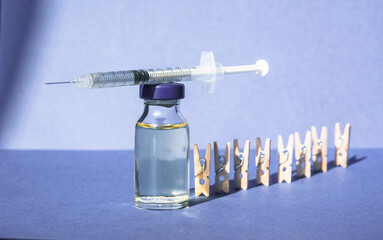 vaccine ampoule, concept of mass vaccination of the population against covid 19 Pro-Vaccine vs...