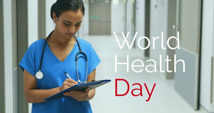 Animation of world health day text over smiling asian female doctor writing in hospital corridor
