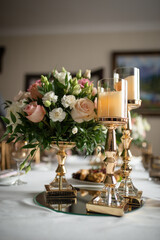 festive decoration of the event . flowers and beautiful candlesticks on the table