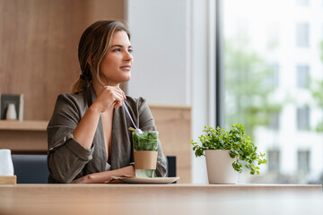 Young businesswoman in a cafe