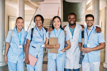 Portrait of happy multiracial medical students look at camera.