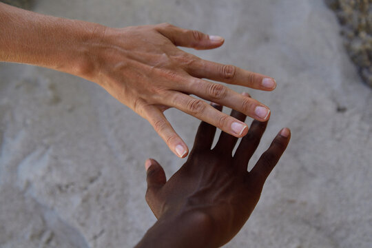 Hands of two women