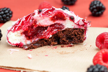 one red cake with a creamy white filling