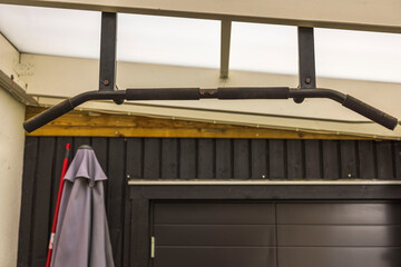 Beautiful view of outdoor mounted pull up bar. Healthy lifestyle concept. Sweden.