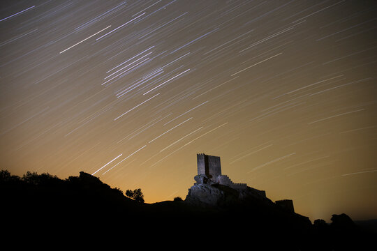 Spain, Guadalajara, Castle of Zafra at night, starry sky