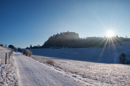 Germany, Baden-Wuerttemberg, Konstanz district, snow-capped path towards Ruins of the Fortress Hohentwiel