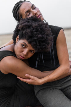 Portrait of two women hugging each other