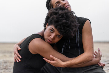 Portrait of two women hugging each other