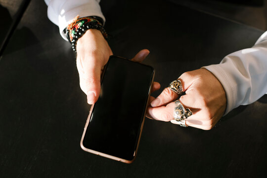 Man's hands with smartphone
