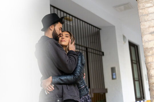 Young couple in love hugging each other