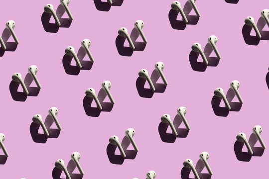 3D Illustration of earphones on pink background