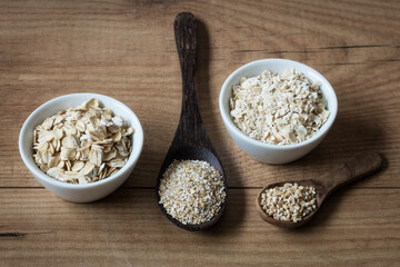 Two variations of oat flakes, oat bran and steel-cut oats