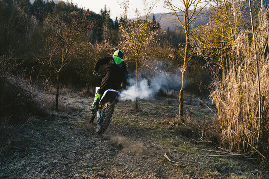 Motocross driver riding on circuit