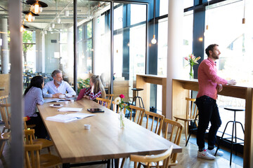 Casual business people having a meeting in a cafe