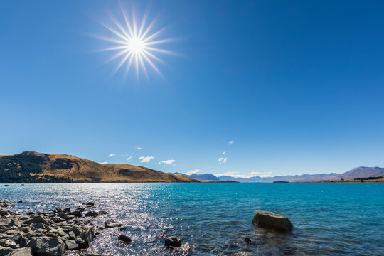 New Zealand, Oceania, South Island, Canterbury, Lake Tekapo, Rocks on lakeshore